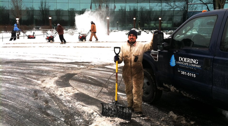 a team with snowblowers quickly clearing an area